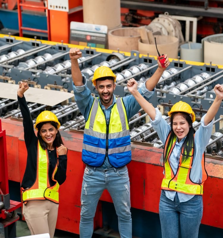 Team of Engineers and Professionals Workers in Heavy Industry Manufacturing Factory. Team of workers